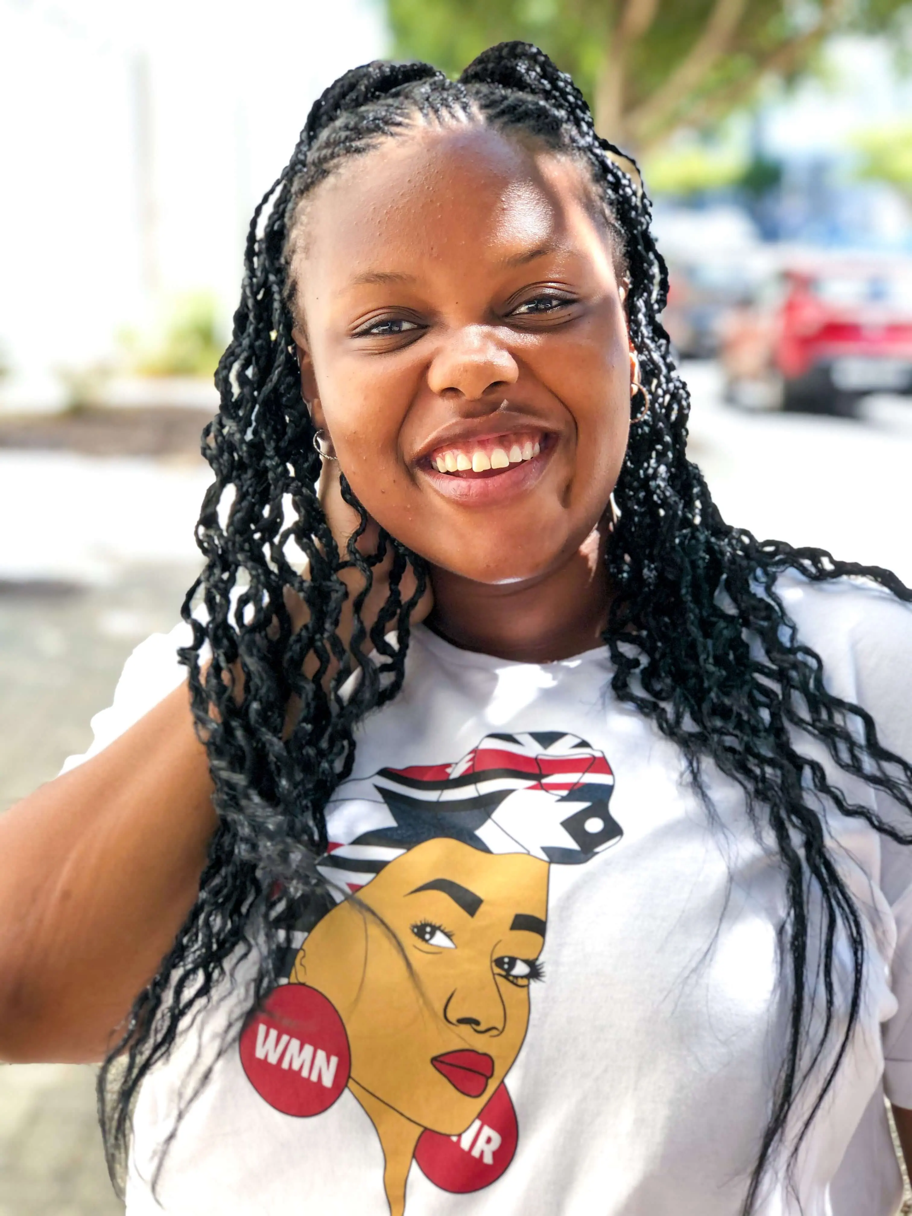 Une femme coiffée avec des Cornrows Braids